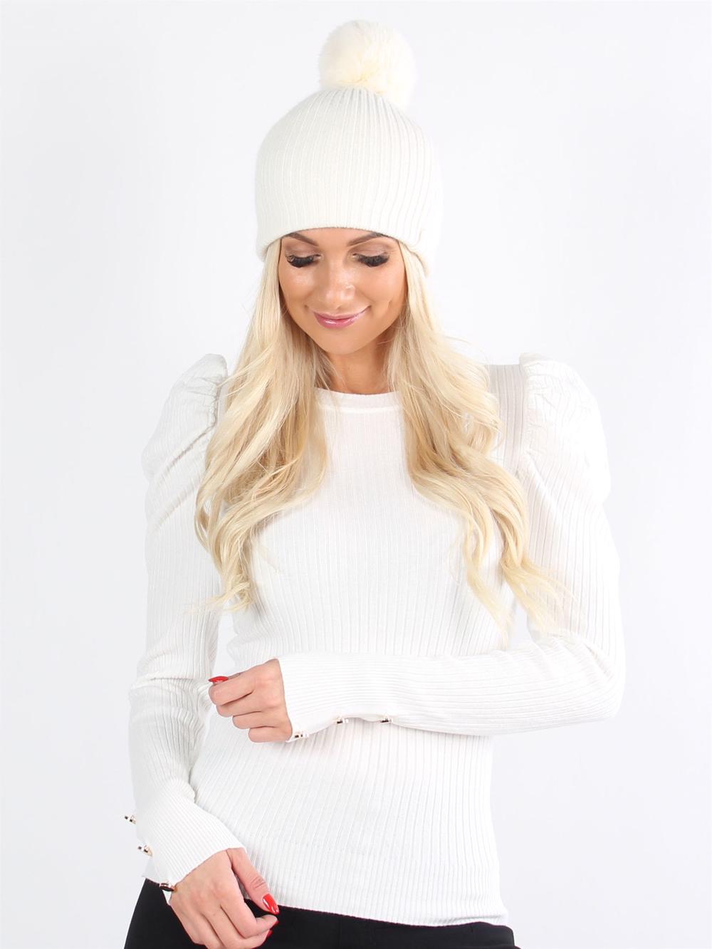 Arrow - Svart feminin stickad blus med puffärmar och guldknappar